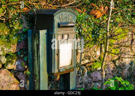 A King George VI post box in Boot in the Lake District, Cumbria, England. Stock Photo