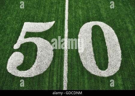 View From Above of 50 Yard Line on American Football Field With Artificial Turf Stock Photo