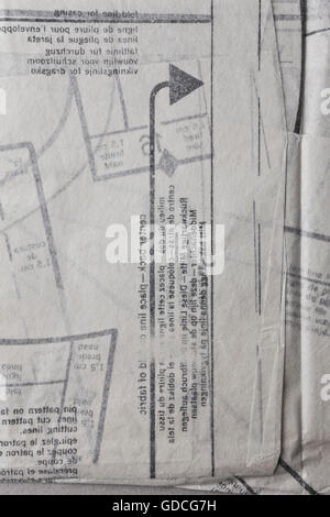 Sewing pattern on thin paper background Stock Photo