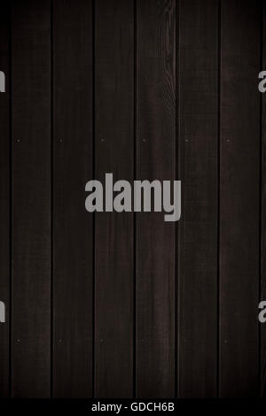 Dark stained wooden wall background Stock Photo