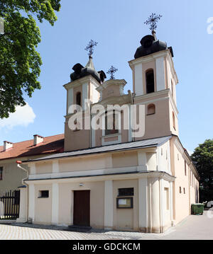 VILNIUS, LITHUANIA - MAY 29, 2016: The church of the Sacred Cross was constructed in 1543. In 1976 the Small Hall of Baroque wit Stock Photo