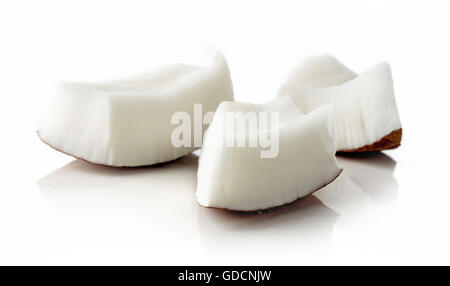 Coconut pieces isolated on white background Stock Photo