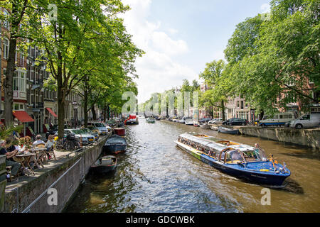 Canal Boat On The Canals Amsterdam Holland Stock Photo