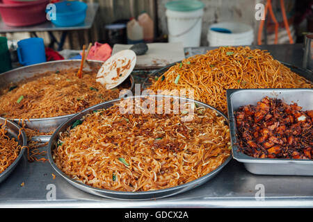 Kway teow fried noodles at the Kimberly Street Food Night Market, George Town, Penang, Malaysia. Stock Photo