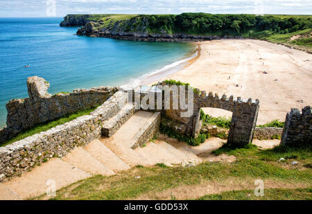 Cliff top castellated entrance to Barafundle Bay near Stackpole on the south west coast of Pembrokeshire in South Wales UK Stock Photo
