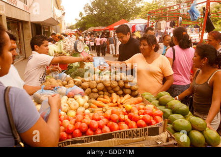 people at the fruitmarket in the town of Maracaibo in the west of Venezuela. Stock Photo