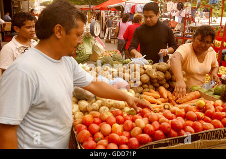 people at the fruitmarket in the town of Maracaibo in the west of Venezuela. Stock Photo