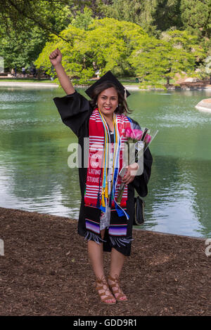 university student attending graduation ceremony at Sonoma State University in Rohnert Park in Sonoma County in California United States Stock Photo