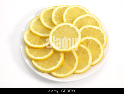 YELLOW LEMON Citrus lemon ON A PLATE Stock Photo
