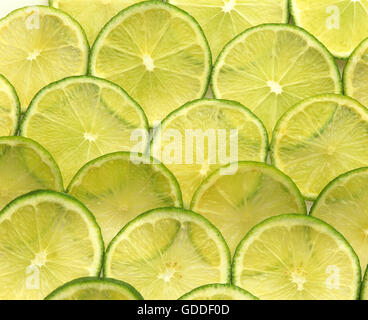 Slices of Green Lemon, citrus aurantifolia Stock Photo