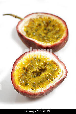 PASSION FRUIT passiflora edulis AGAINST WHITE BACKGROUND Stock Photo