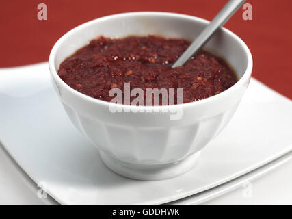 Bowl with Harissa, North-African Chili Sauce Stock Photo