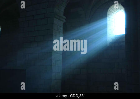 RAYS OF SUNLIGHT SHINING THROUGH WINDOW, CHURCH IN DROME, SOUTH EST OF FRANCE Stock Photo