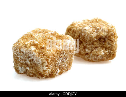 Brown Sugar, Cubes against White Background Stock Photo