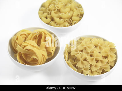 Different Varieties of Pasta,  Pasta shells,   Tagliatelles, Twisted pasta Stock Photo