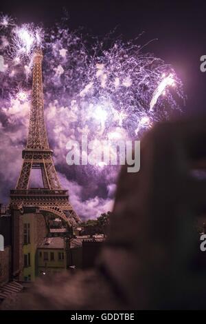 Paris, France. 15th July, 2016. View from a nearby rooftop of the Eiffel Tower and the celebratory fireworks thrown on France's National Day Credit:  Aurelien Foucault/ZUMA Wire/Alamy Live News Stock Photo