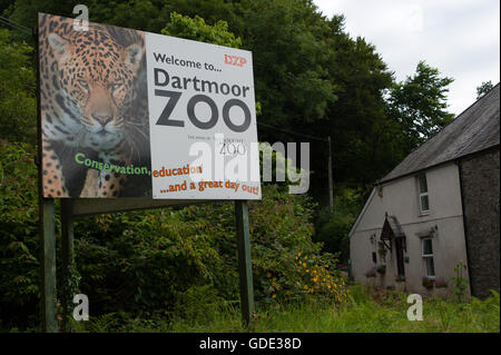 Sparkwell, Devon, UK. 16th July 2016. The entrance to Dartmoor Zoo. The dream wedding reception of Max Weeks and Charlie-Jane Swain, at Dartmoor Zoo in Sparkwell, Devon, UK. had been cancelled until a few days ago because of the recent escape of Flaviu a two-year-old male Carpathian Lynx. Concerns over safety at the zoo, and noise which might scare Flaviu, prompted the cancellation but it was decided at the 'eleventh hour' that the reception would go ahead today with increased security staff and noise levels kept down to a minimum. Credit:  Graham M. Lawrence/Alamy Live News. Stock Photo