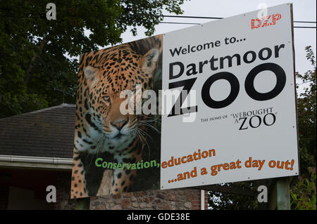 Sparkwell, Devon, UK. 16th July 2016. The entrance to Dartmoor Zoo. The dream wedding reception of Max Weeks and Charlie-Jane Swain, at Dartmoor Zoo in Sparkwell, Devon, UK. had been cancelled until a few days ago because of the recent escape of Flaviu a two-year-old male Carpathian Lynx. Concerns over safety at the zoo, and noise which might scare Flaviu, prompted the cancellation but it was decided at the 'eleventh hour' that the reception would go ahead today with increased security staff and noise levels kept down to a minimum. Credit:  Graham M. Lawrence/Alamy Live News. Stock Photo