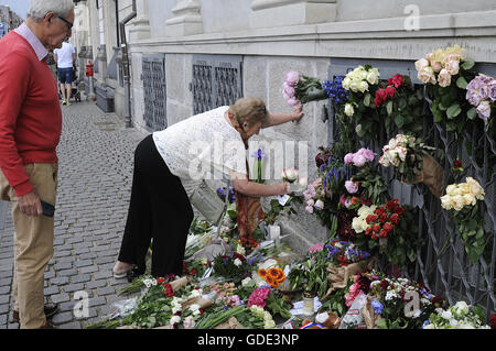 Copenhagen, Denmark. 16th July, 2016.-European union and French flags at half mast at french embassy and people are puring with flowers to pay tribute and stand solidatry with Frnech victims dies in terrorist attacked in Nice France on French national day on july 14, 2016 Credit:  Francis Joseph Dean/Dean Pictures/Alamy Live News Stock Photo