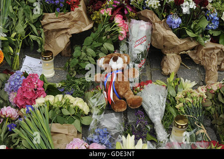 Copenhagen, Denmark. 16th July, 2016.-European union and French flags at half mast at french embassy and people are puring with flowers to pay tribute and stand solidatry with Frnech victims dies in terrorist attacked in Nice France on French national day on july 14, 2016 Credit:  Francis Joseph Dean/Dean Pictures/Alamy Live News Stock Photo