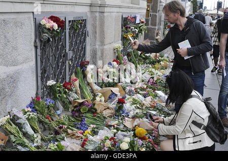 Copenhagen, Denmark. 16th July, 2016.-European union and French flags at half mast at french embassy and people are puring with flowers to pay tribute and stand solidatry with Frnech victims dies in terrorist attacked in Nice France on French national day on july 14, 2016 Credit:  Francis Joseph Dean/Dean Pictures/Alamy Live News Stock Photo