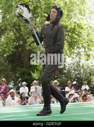 London, 16th July 2016. Contestants dressed in eccentric clothes attend the Chap Olympiad in Bedford Square London to celebrate Britain's Sporting ineptitude, involving   track and field events including  The Tea Pursuit on bicycles, Well Dressage and Umbrella Jousting with points awarded for style Credit:  amer ghazzal/Alamy Live News Stock Photo
