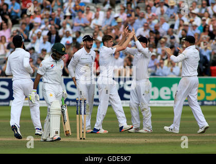 16.07.2016. Lord's, London, England. The First Investec Cricket Test Match. England versus Pakistan. England's fast bowler Chris Woakes celebrates taking the wicket of Pakistan's Asad Shafiq with James Vince, Gary Ballance and Joe Root