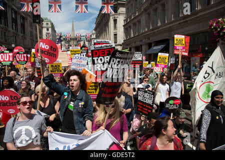 London, UK. 16th July, 2016. Peoples Assembly demonstration: No More Austerity - No To Racism - Tories Must Go, on Saturday July 16th in London, United Kingdom. Tens of thousands of people gathered to protest in a march through the capital protesting against the Conservative Party cuts. Almost 150 Councillors from across the country have signed a letter criticising the Government for funding cuts and and will be joining those marching in London. Credit:  Michael Kemp/Alamy Live News Stock Photo