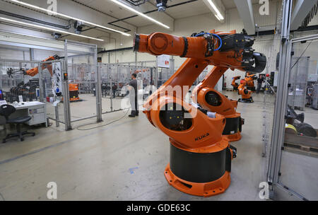 Augsburg, Germany. 14th July, 2016. A Kuka robot stands at the production site of robot manufacturer Kuka in Augsburg, Germany, 14 July 2016. Photo: Karl-Josef Hildenbrand/dpa/Alamy Live News Stock Photo
