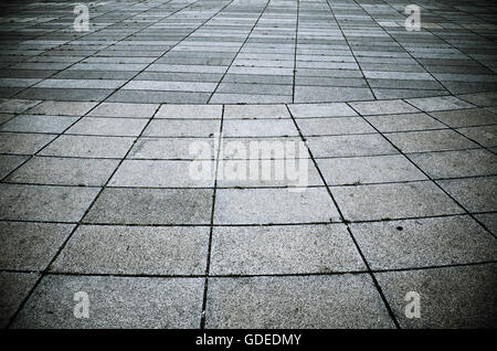 pavement made of squared tiles Stock Photo