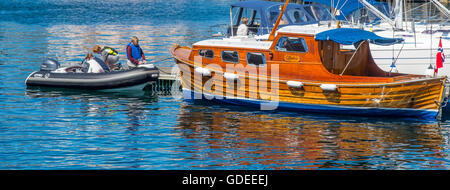 Colorful Old Wooden boat moored in Brosundet Canal. Alesund, Norway, More og Romsda, Scandinavia, European Stock Photo