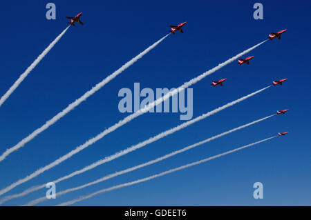RAF Red Arrows display team arriving at air show in formation, Stock Photo