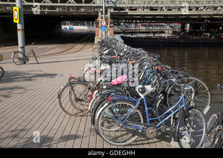 Bikes outside Ceentral - Central Railway Station, Amsterdam; Holland Stock Photo