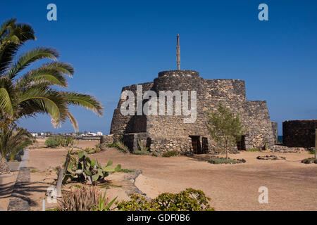 Old fortress on the beach promenade of Caleta de Fuste, Fuerteventura, Canary Islands, Spain, Europe Stock Photo