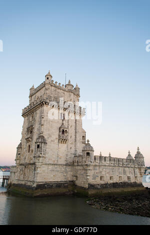 LISBON, Portugal -- Built on a small island near the banks of the Tagus River just to the southwest of downtown Lisbon, the Tower of Belem (or Torre de Belém) dates to 1514-1520. It was part of a defensive network protecting shipping to Lisbon port and beyond during Portugal's Age of Discovery. Paired with the nearby Jerónimos Monastery it is listed as a UNESCO World Heritage Site. Stock Photo