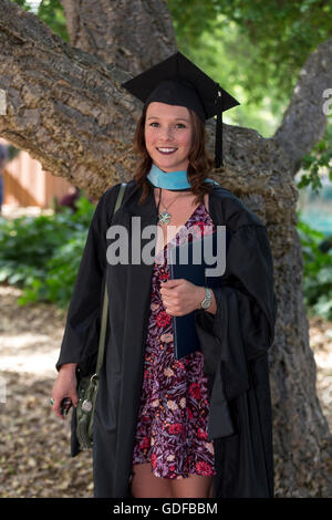 university student attending graduation ceremony at Sonoma State University in Rohnert Park in Sonoma County in California United States Stock Photo