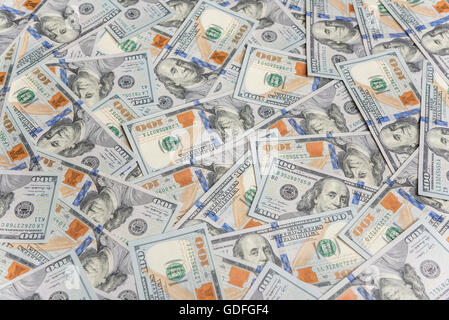 One hundred dollars background. Background paved with hundred dollar bills. Stock Photo