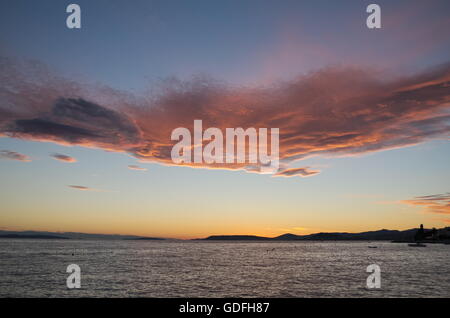 Sunset Over Split, Croatia with Calm Sea and Magical Clouds Horizontal Stock Photo