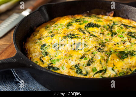 Homemade Spinach and Feta Fritatta in a Skillet Stock Photo