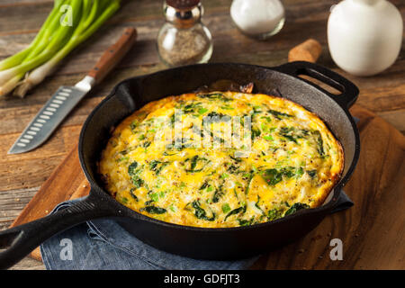 Homemade Spinach and Feta Fritatta in a Skillet Stock Photo