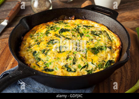 Homemade Spinach and Feta Fritatta in a Skillet Stock Photo