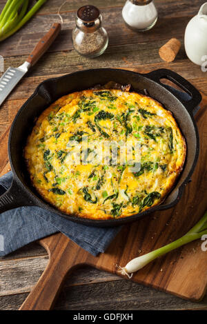 Homemade Spinach and Feta Fritatta in a Skillet Stock Photo