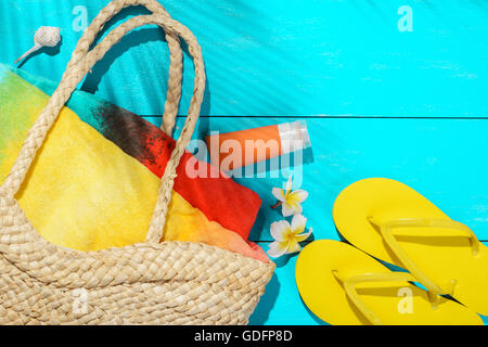 beach accessories on the blue wooden board Stock Photo