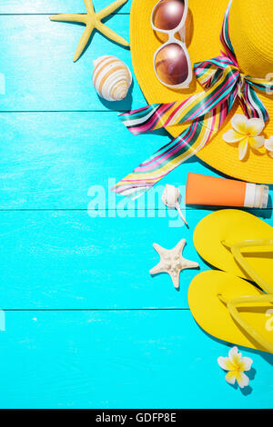 beach accessories on the blue wooden board Stock Photo
