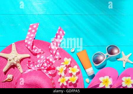 beach accessories on the blue wooden board Stock Photo