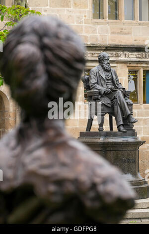 Mary Webb and Charles Darwin statues outside Shrewsbury library, Shropshire, England, UK Stock Photo