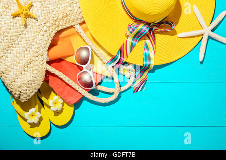beach accessories on the blue wooden board Stock Photo