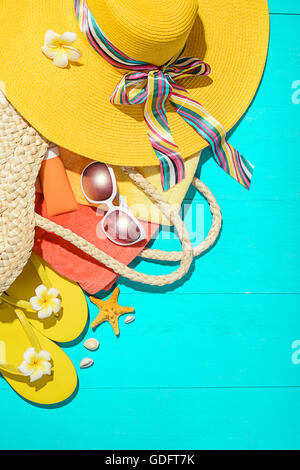 beach accessories on the blue wooden board Stock Photo