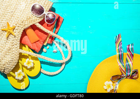 beach accessories on the blue wooden board Stock Photo