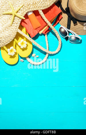 beach accessories on the blue wooden board Stock Photo